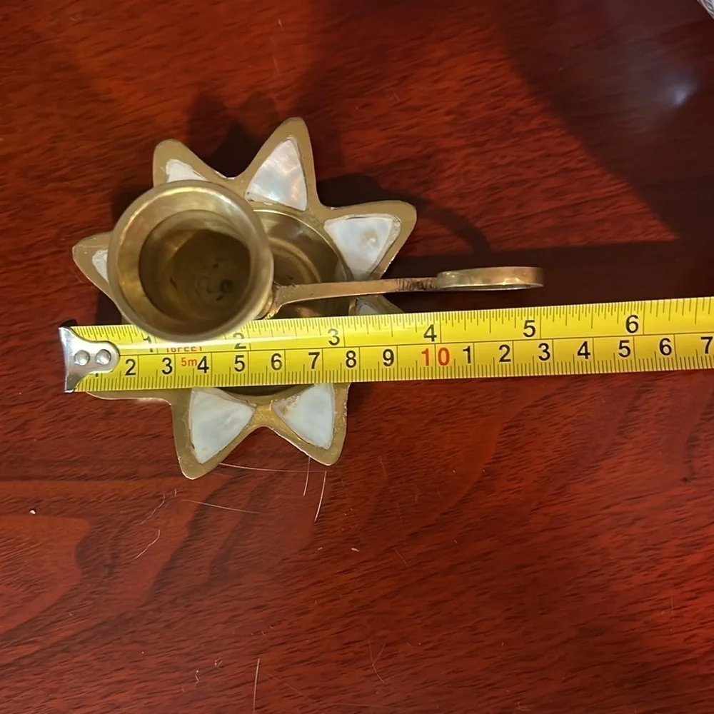 Brass candle holder.